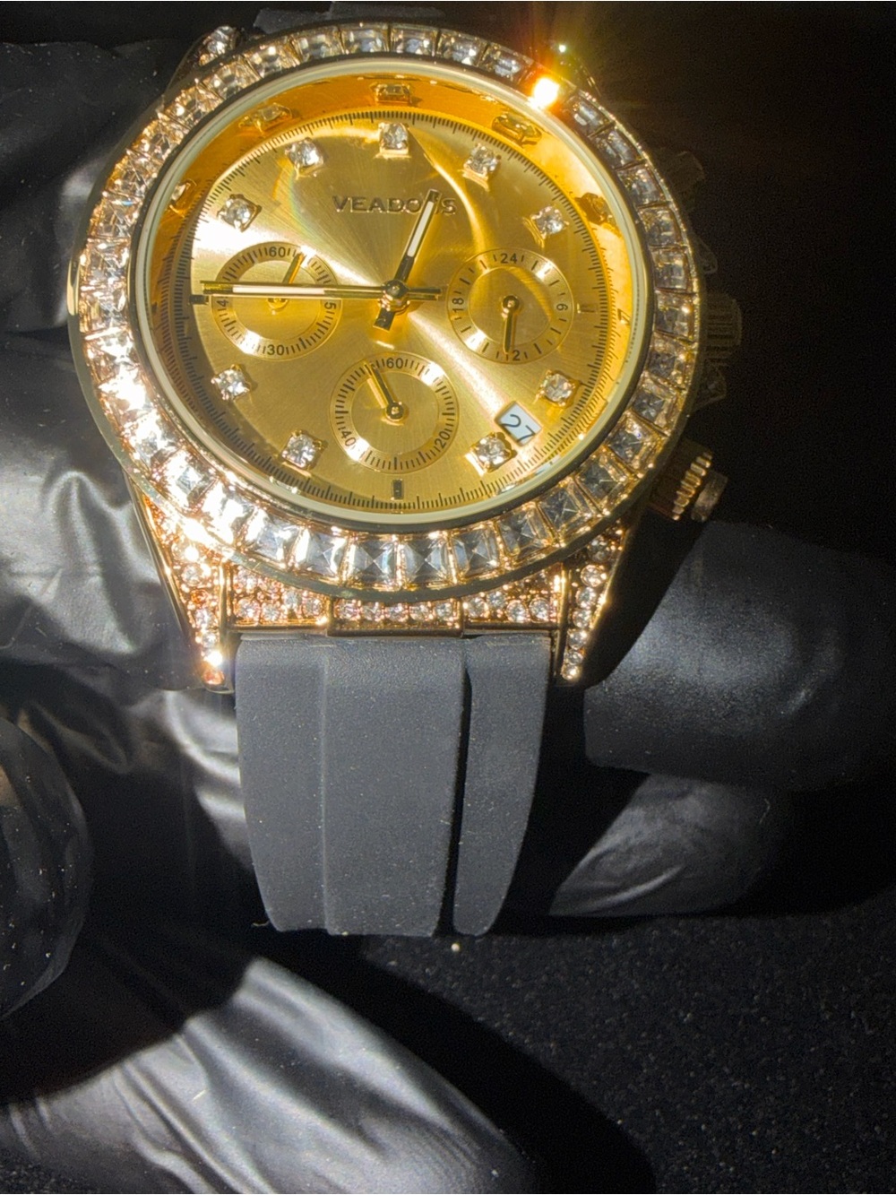 Gold Chronograph Watch with Black Strap